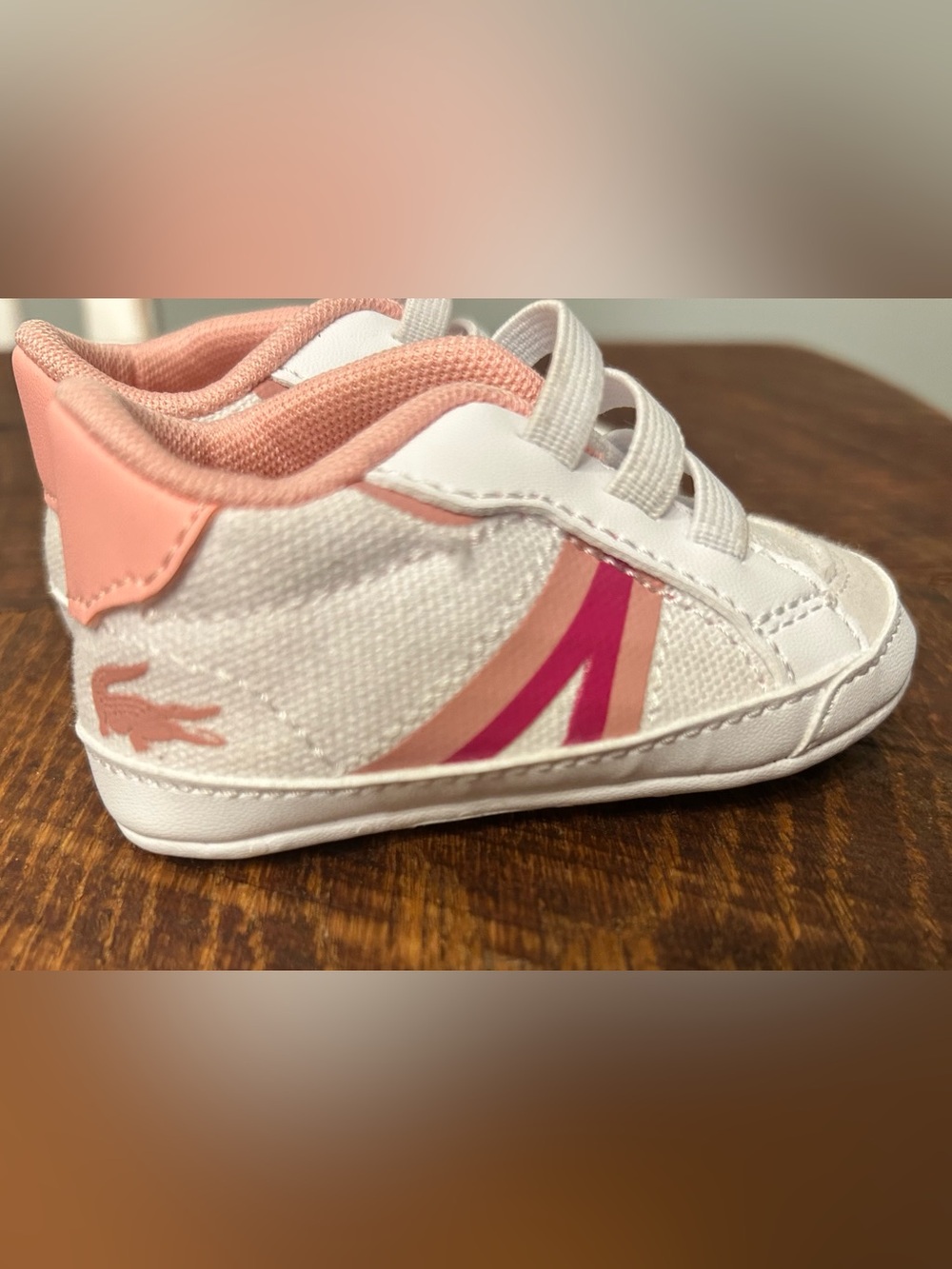 infant's Lacoste L004 Crib/Cub sneaker in white and pink, size 1